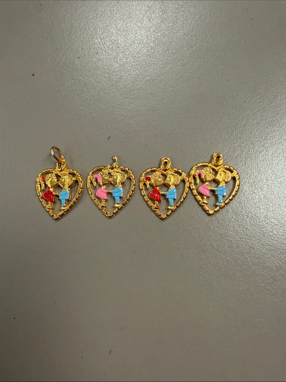 Gold Tone Heart Pendants charm lot of 4 girl and boy  holding hands inside hear